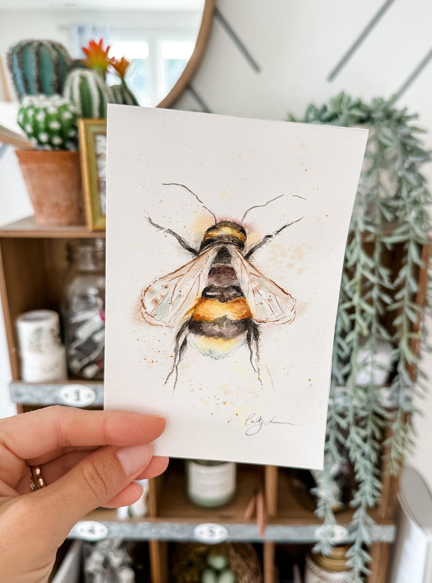 sitting bee in boho frame