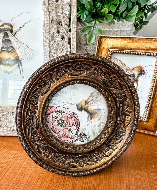 tiny bee in vintage frame